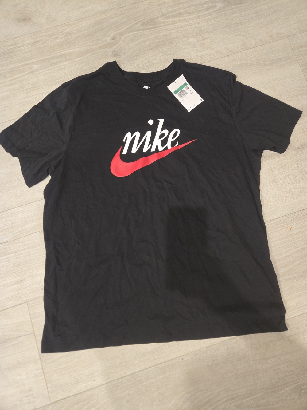 Nike Black Short Sleeve Tee with Red Swoosh and White Script
